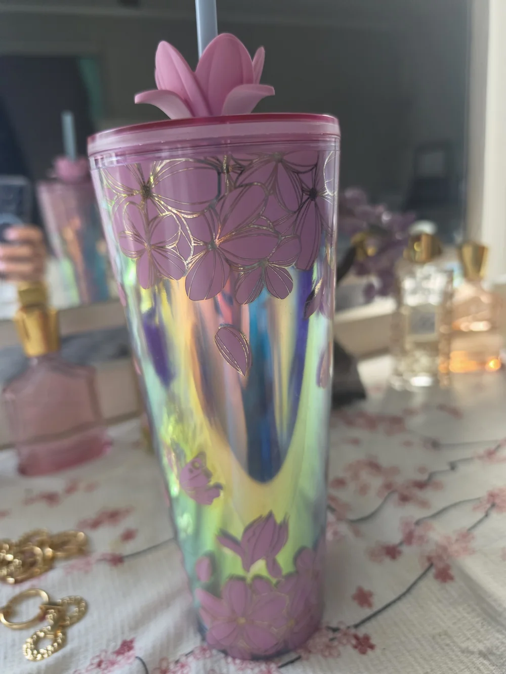 Pink Starbucks Cherry Blossom cold cup featuring an iridescent finish
